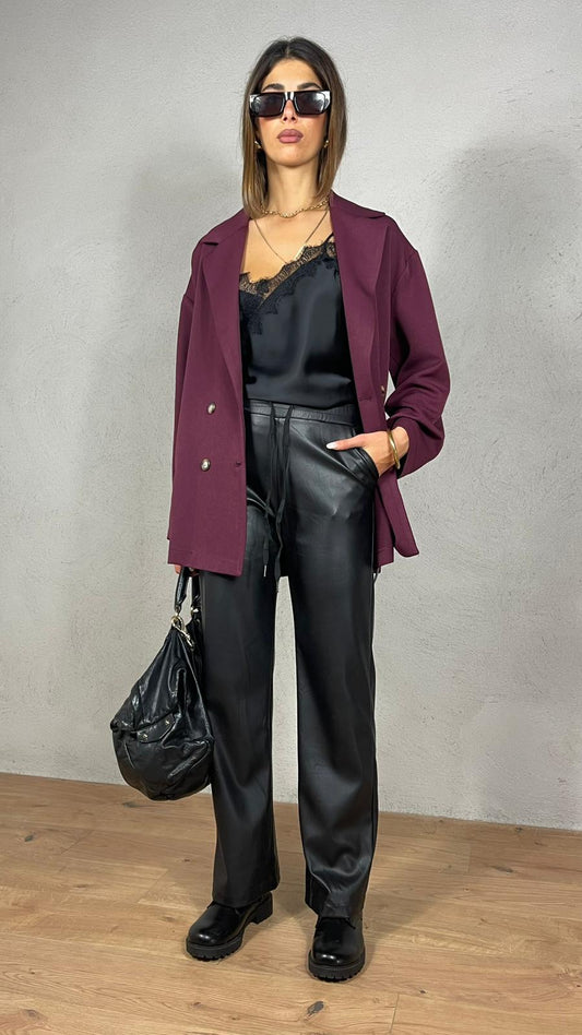 Pantalón efecto piel de pierna ancha