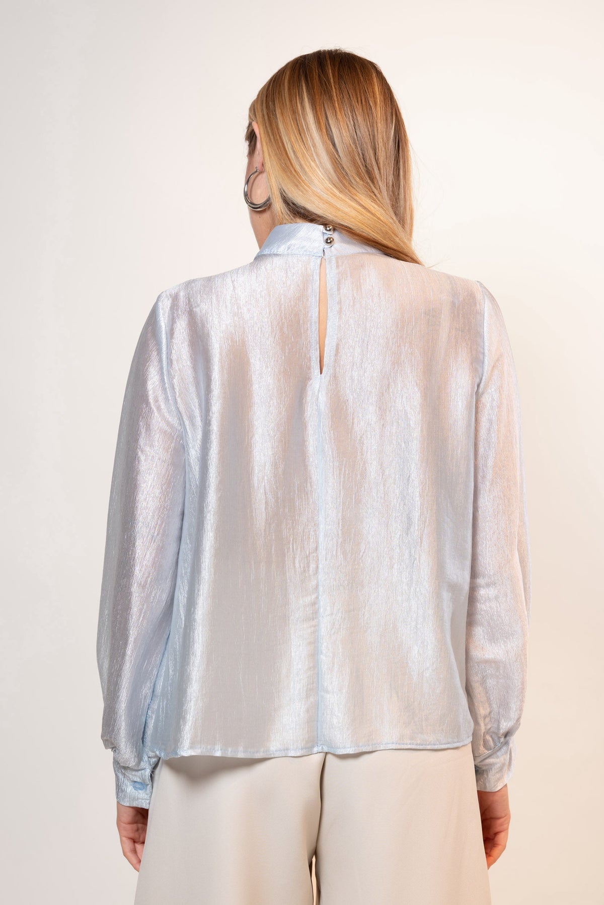 Blusa iridiscente