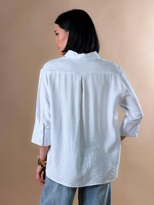 Camisa con botones y mangas tres cuartos