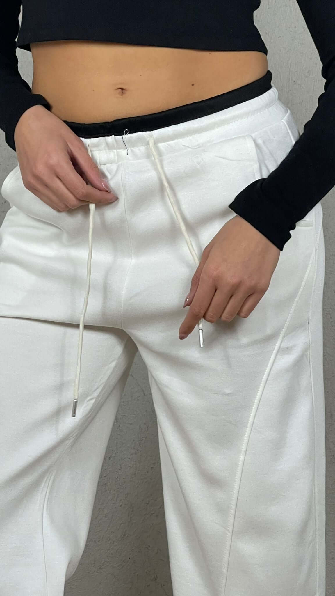 Pantalón felpa efecto doble corsé