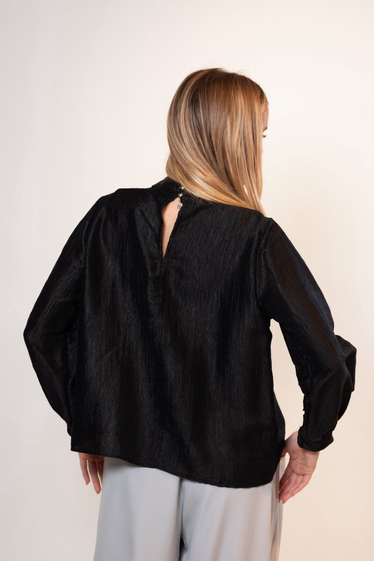 Blusa iridiscente