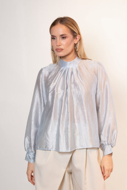 Blusa iridiscente