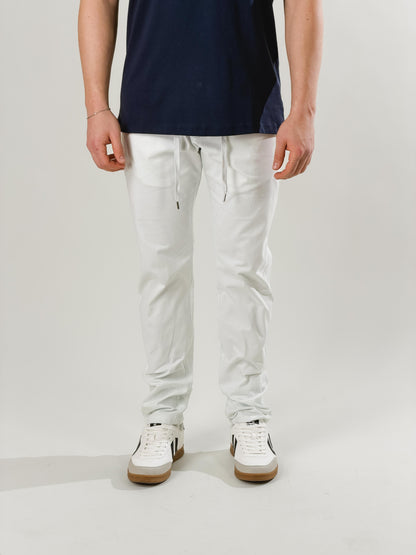 Pantalón slim fit con cordón