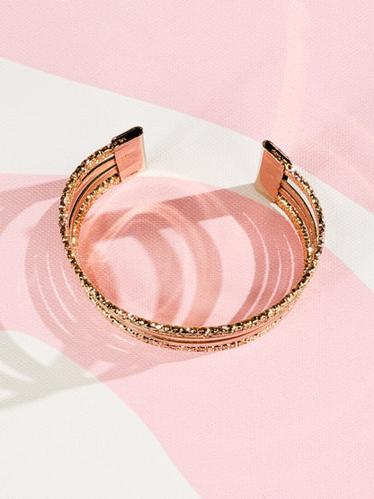 Pulsera rígida de filas múltiples