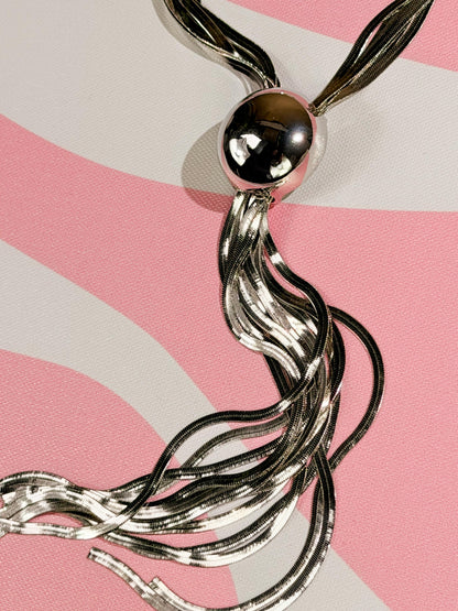 Collar esfera y flecos