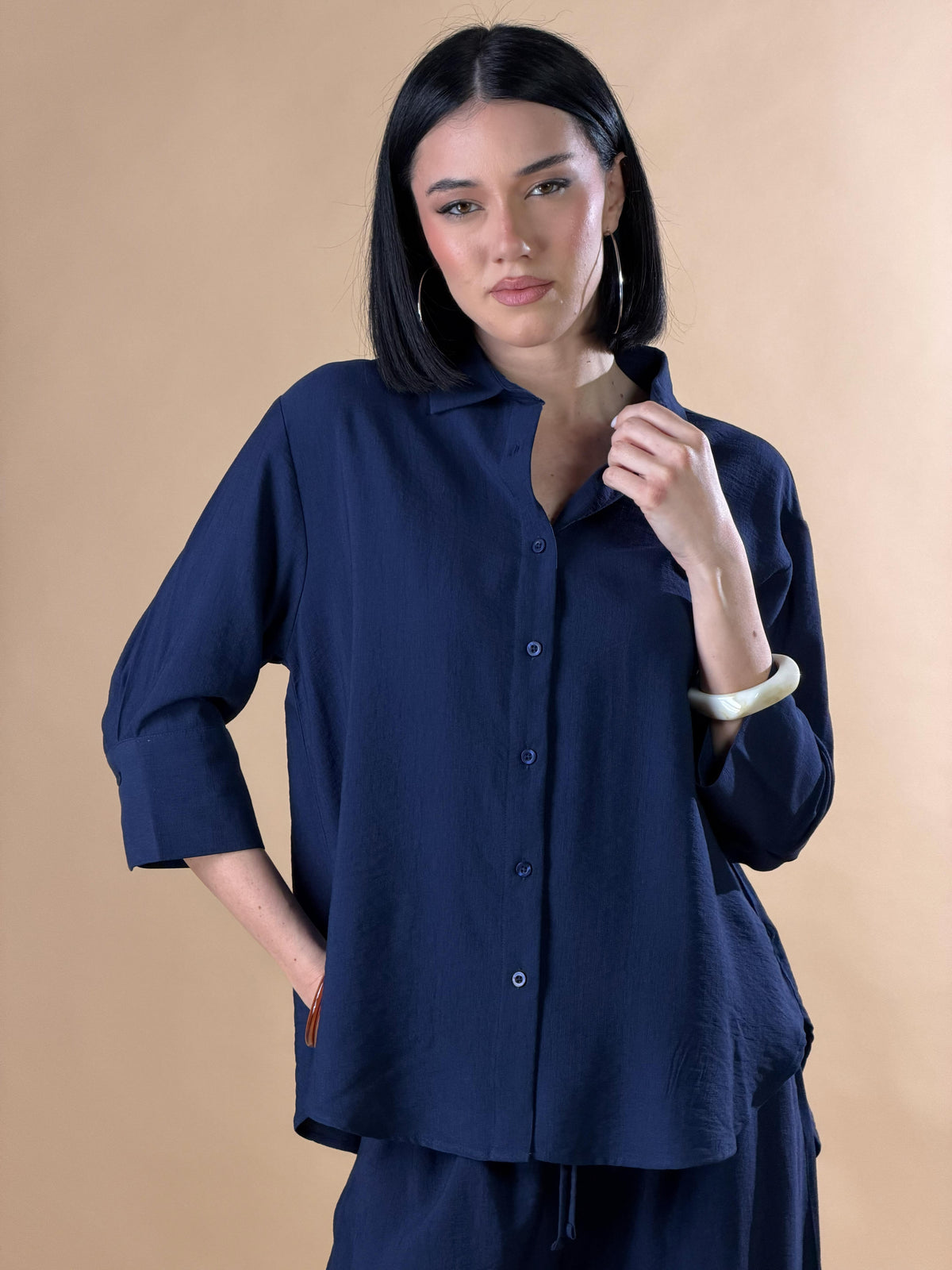 Camisa con botones y mangas tres cuartos