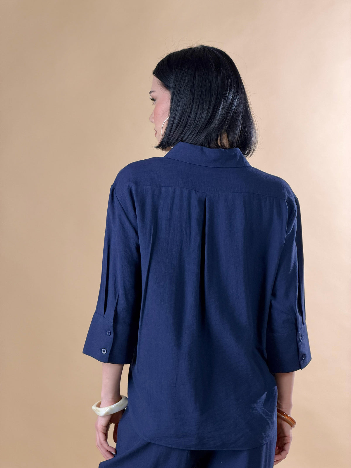 Camisa con botones y mangas tres cuartos