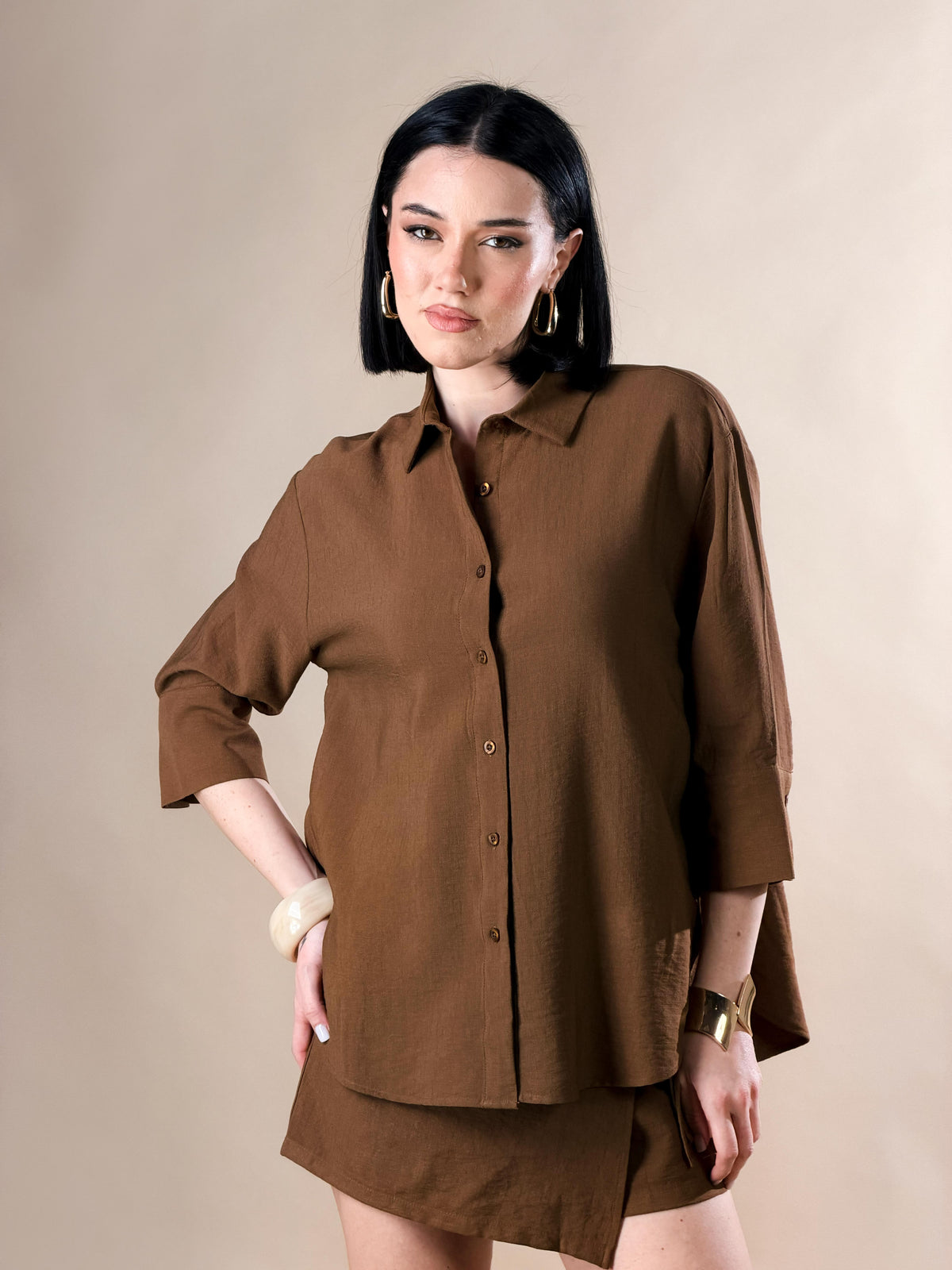 Camisa con botones y mangas tres cuartos